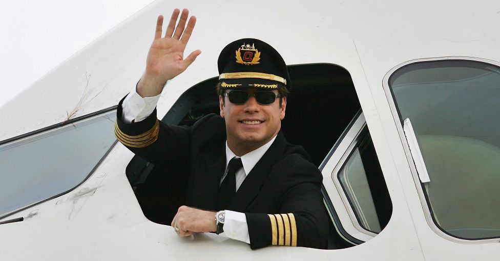 Actor John Travolta waves from the cockpit of an Airbus A380 at Brisbane International Airport on November 15, 2005 in Brisbane, Australia