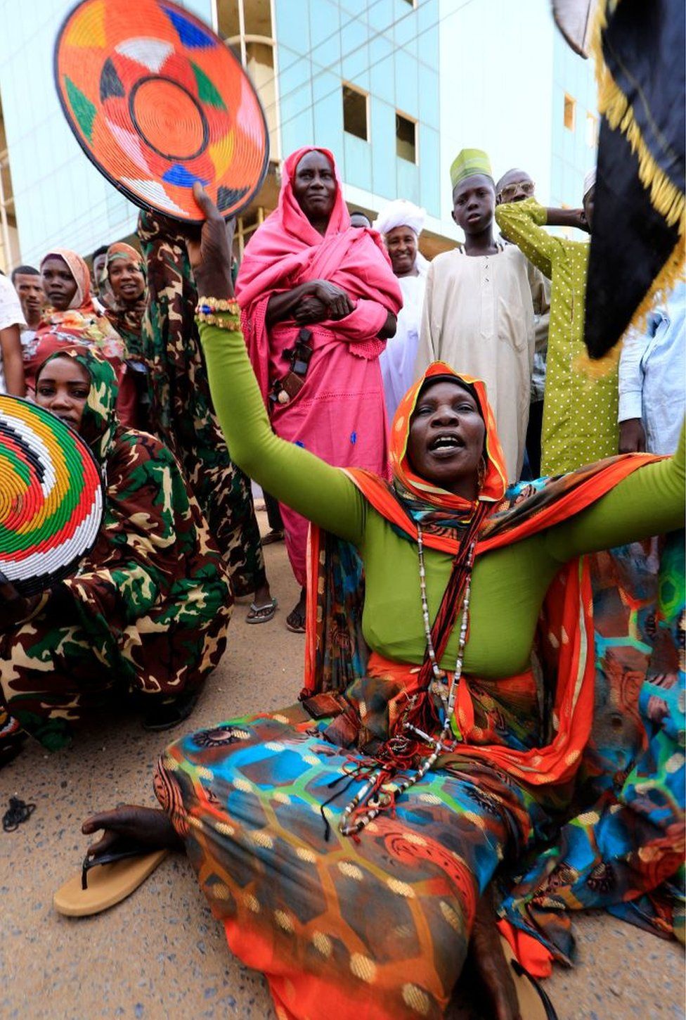 Sudanese protesters take part in a sit-in.