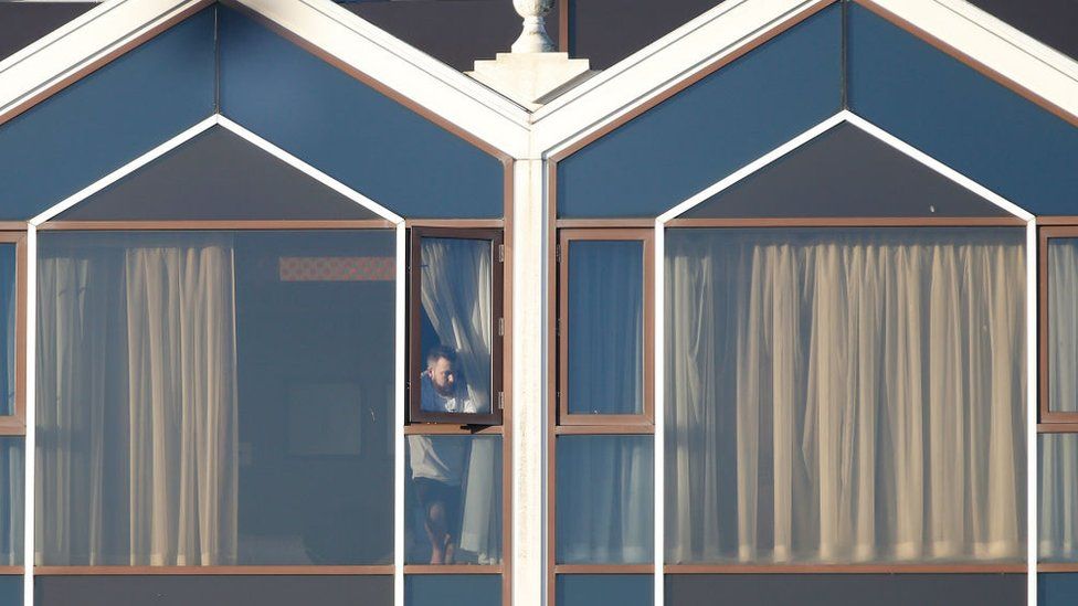File pic of people in hotel quarantine near Heathrow