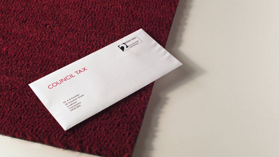 Council tax letter on a red mat