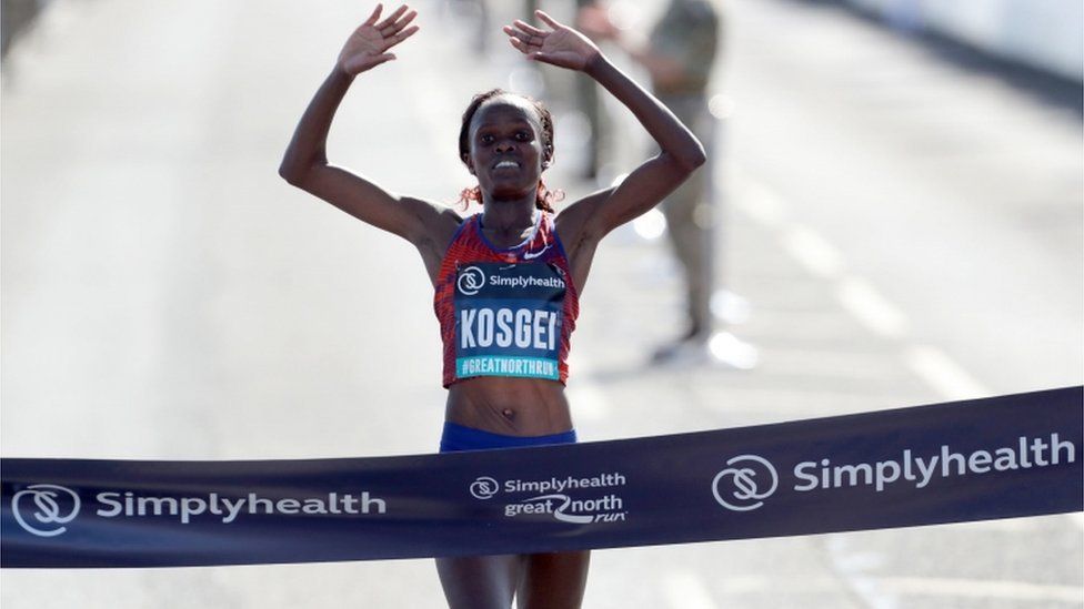 Brigid Kosgei crossing the finish line