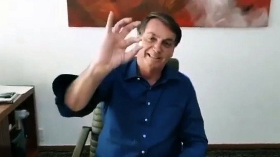 Jair Bolsonaro appears in a Facebook video taking a treatment for coronavirus