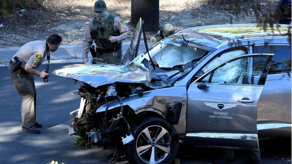 Los Angeles County Sheriff"s Deputies inspect the vehicle of golfer Tiger Woods after the accident in Los Angeles, California, February 23, 2021