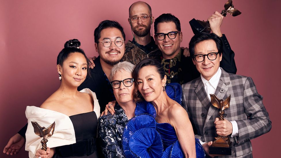 (L-R) Stephanie Hsu, Daniel Kwan, Jamie Lee Curtis, Daniel Scheinert, Michelle Yeoh, Jonathan Wang, and Ke Huy Quan, winners of the Best Feature award for "Everything Everywhere All at Once, pose in the IMDb Portrait Studio at the 2023 Independent Spirit Awards on March 04, 2023 in Santa Monica, California