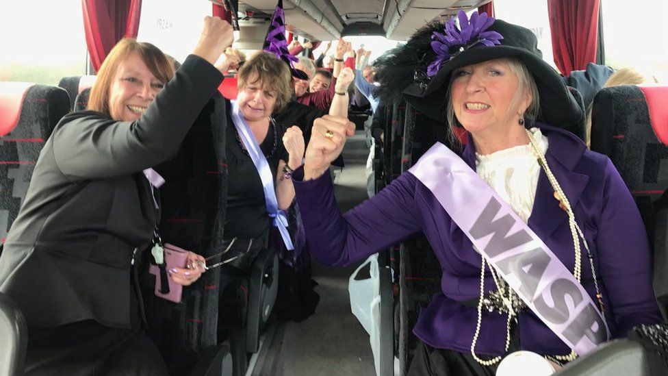 WASPI members travelling on a bus to London to take part in a rally