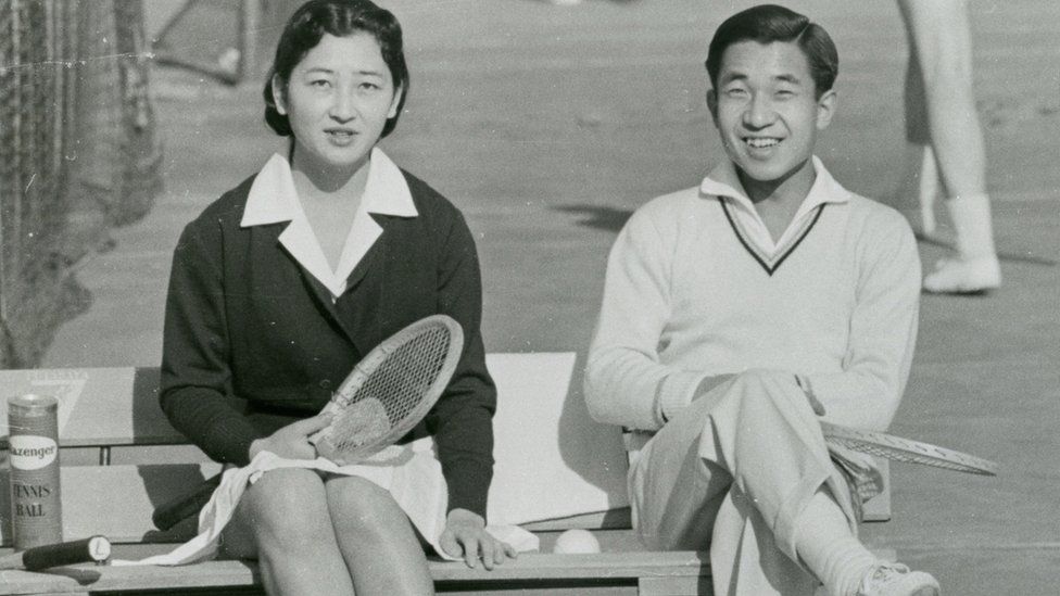Crown Prince Akihito and Michiko Shoda enjoy tennis at Tokyo Lawn Tennis Club on December 6, 1958 in Tokyo, Japan