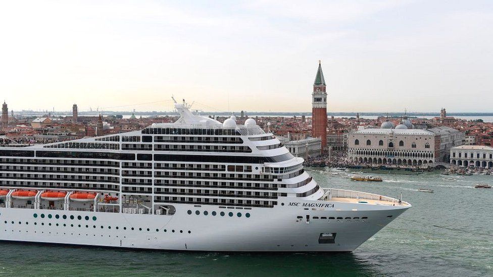 The MSC Magnifica cruise ship is seen from San Maggiore's bell tower leaving in the Venice Lagoon on June 9, 2019.