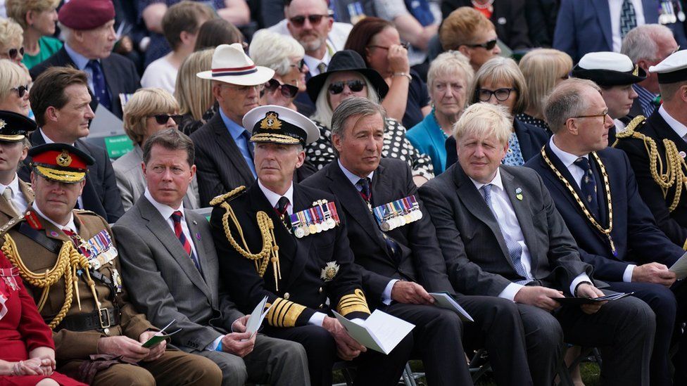 Prime Minister Boris Johnson (front row 3rd right) with Veterans, civilians and bereaved family members attend a service to mark the 40th anniversary of the liberation of the Falkland Islands at the National Memorial Arboretum in Alrewas, Staffordshire
