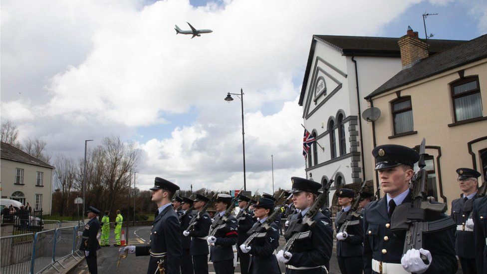 A P8 Poseidon flying past the RAF parade at the memorial in Limavady