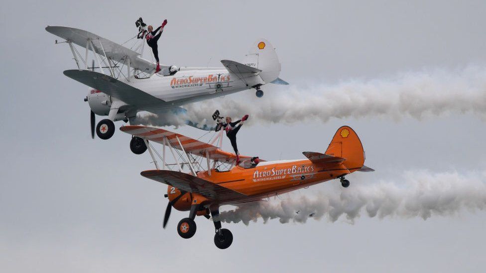 AeroSuperBatics Wingwalkers perform during the Bournemouth Air Festival on September 02, 2021 in Bournemouth,