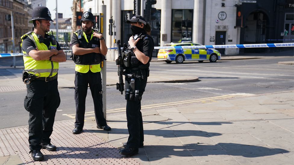 Police officers in Nottingham city centre, as a 31-year-old man has been arrested on suspicion of murder after three people were killed in Nottingham early on Tuesday morning on Tuesday 13 June 2023