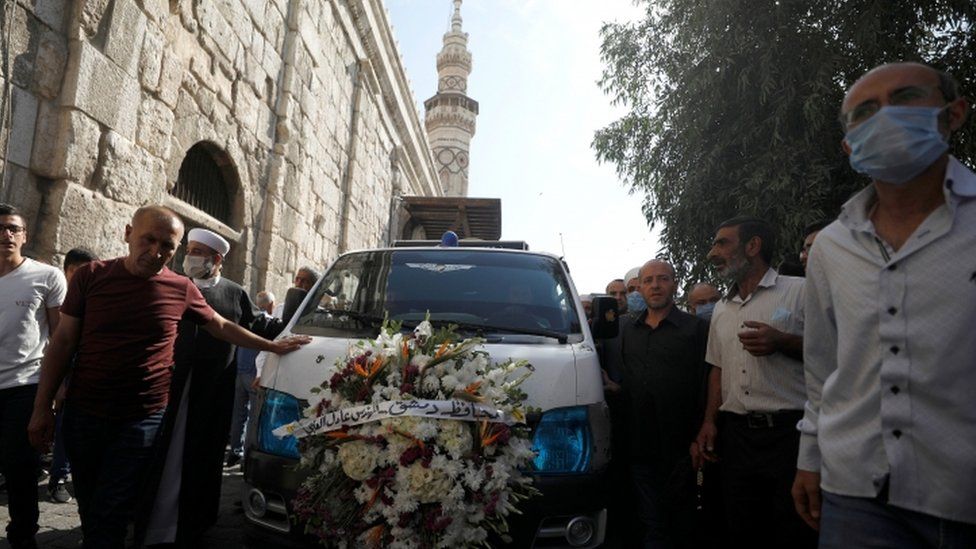 Mourners in a Damascus street