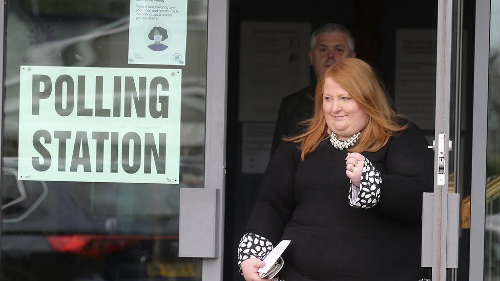 Naomi Long at a polling station