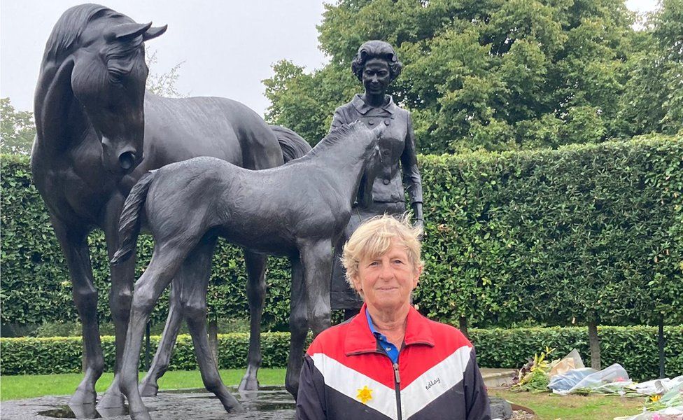 Joanne Banks at the statue of the Queen in Newmarket