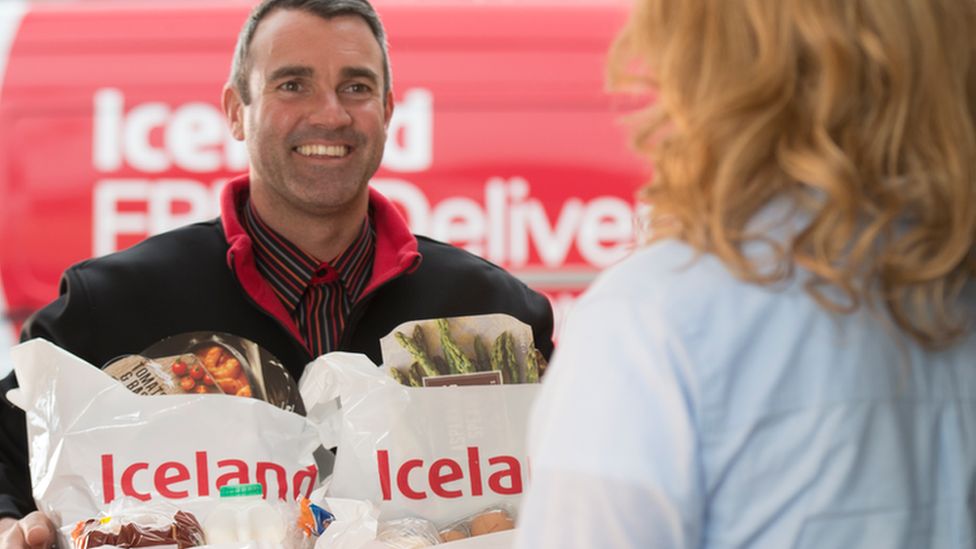 Iceland delivery driver with goods