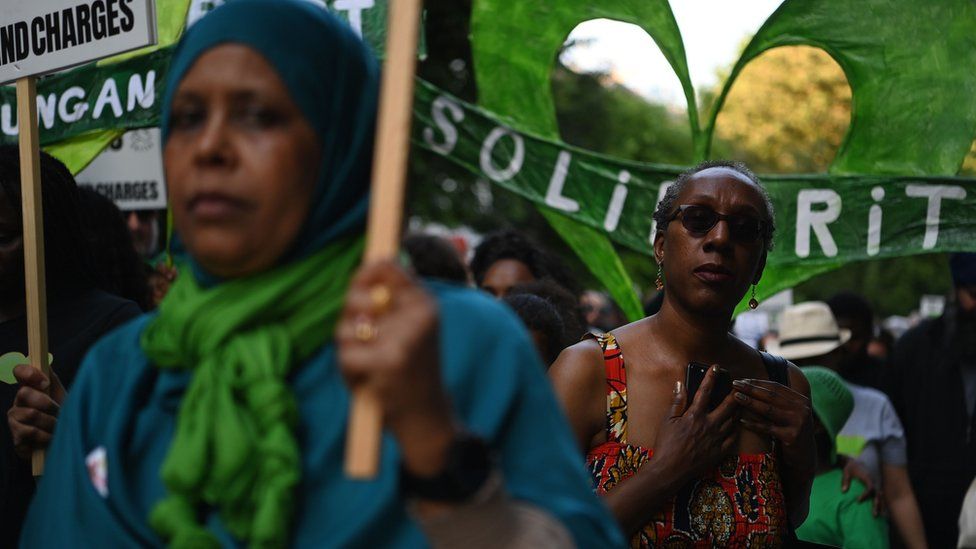 The Grenfell community participate in a silent march in London on 14 June 2023