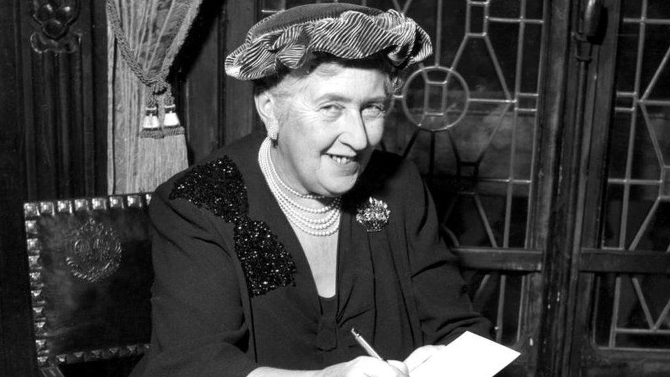 British mystery author Agatha Christie (1890-1976) autographing French editions of her books, circa 1950. (Photo by Hulton Archive/Getty Images)