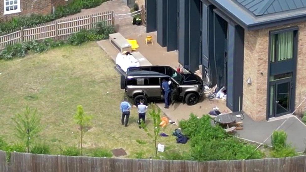 A Land Rover Defender is seen inside the grounds of The Study Preparatory School in Camp Road, Wimbledon, south London