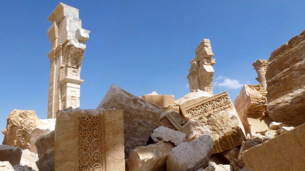A general view taken on March 27, 2016 shows part of the remains of the Arc de Triomph (Triumph Arc) monument that was destroyed by Islamic State (IS) group jihadists in October 2015 in the ancient Syrian city of Palmyra