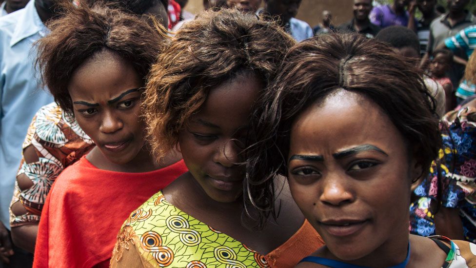 Voters queue to cast their ballots at a symbolic polling station on December 30, 2018, at Malepe Stadium in Beni, where voting was postponed for Democratic Republic of Congo's general elections.