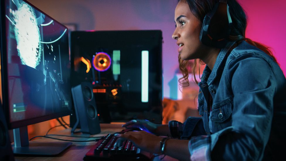 Girl gamer on computer