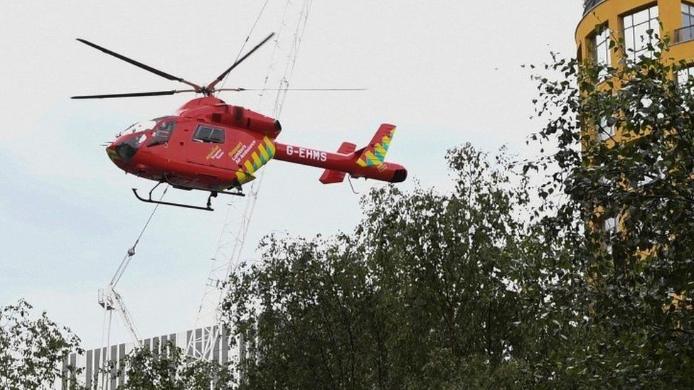 A London Air Ambulance helicopter takes off from outside the Tate Modern