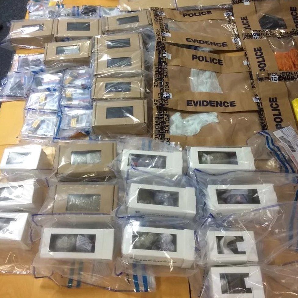 Recovered drugs and mobile phones