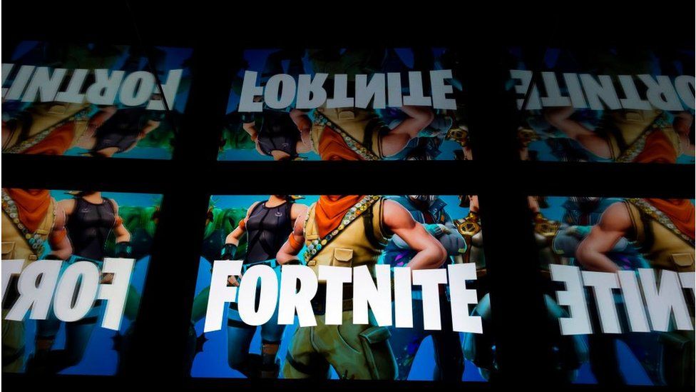 This illustration picture shows the video game Fortnite logo displayed on a tablet in Paris, on February 18, 2019