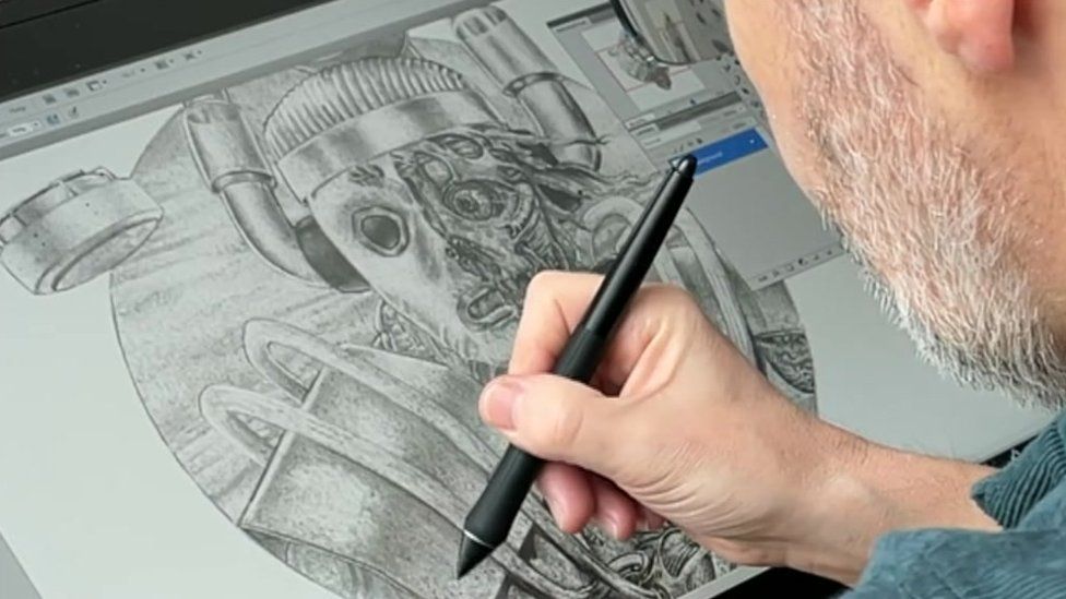 Colin Howard working on a drawing