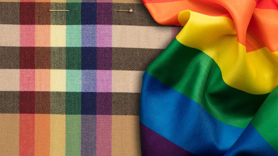 The new Burberry rainbow scarf next to the LGBT flag