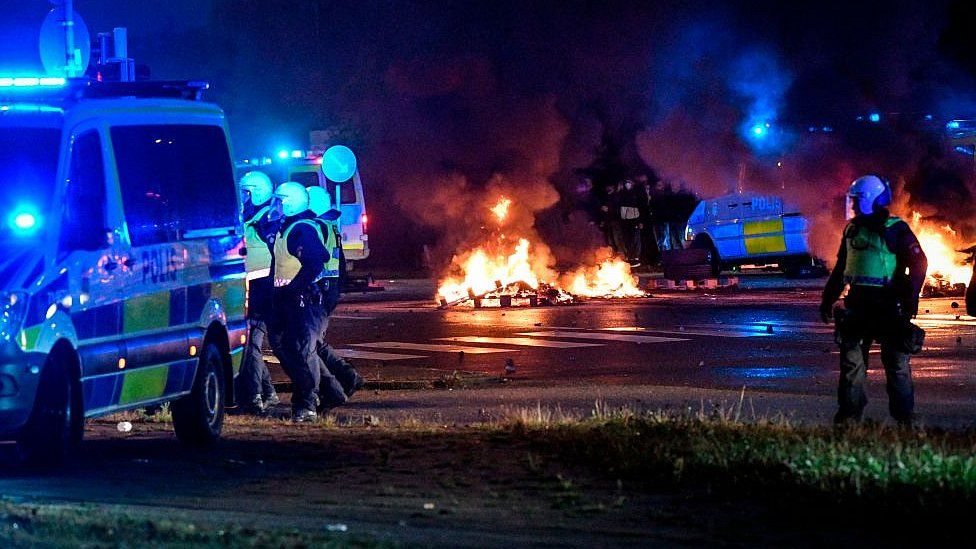 Protesters riot in the Rosengard neighbourhood of Malmo, Sweden, on August 28, 2020