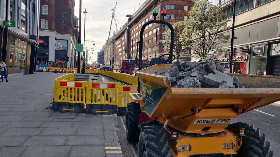 Construction work and digger on Oxford Street