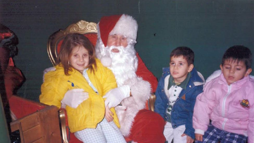 Allan and his siblings meeting Father Christmas