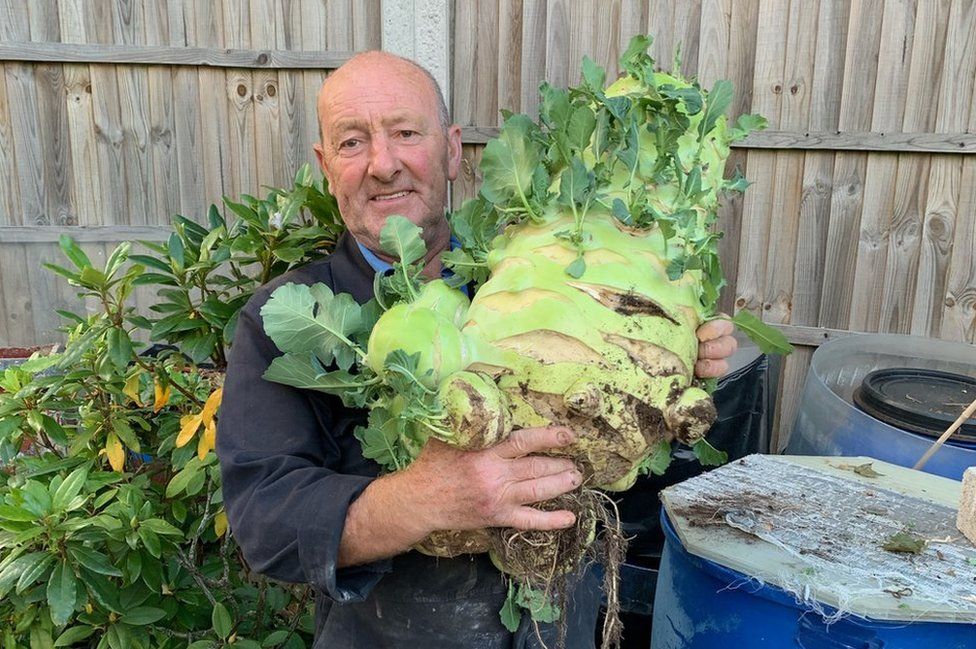 Joe Atherton with his giant vegetables