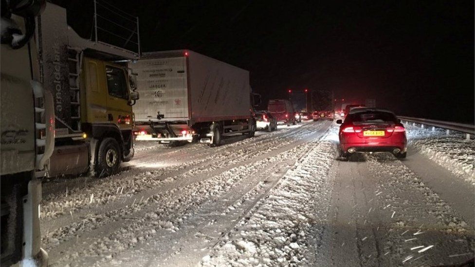 Vehicles are seen stuck in traffic on the M74 south of Glasgow