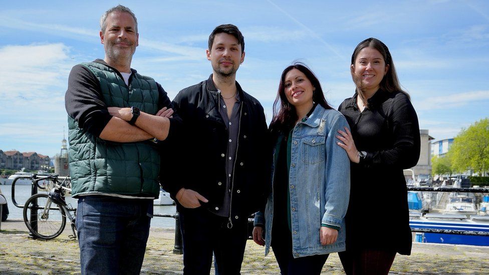 The four organisers of the Bristol Harbour Festival stand next to each other in the centre of Bristol