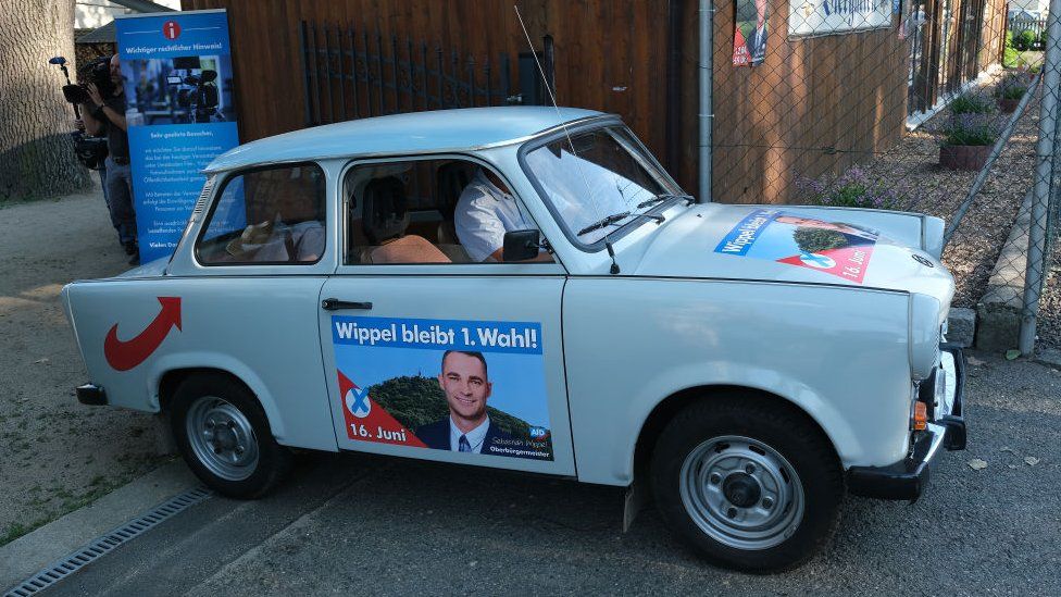 A car decorated with election campaign posters for Sebastian Wippel, mayoral candidate of the right-wing Alternative for Germany (AfD)