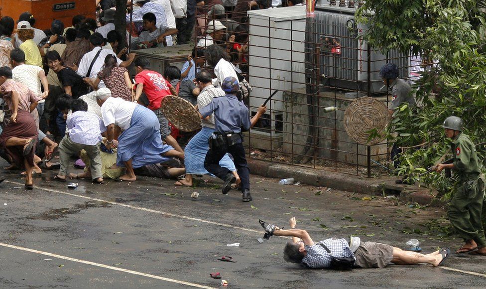 Kenji Nagai lies injured after being shot by a Burmese soldier