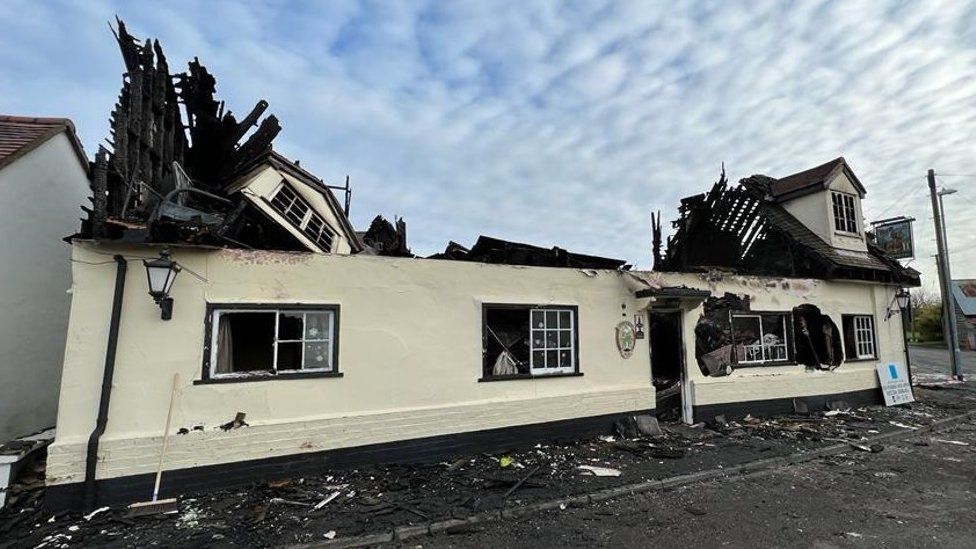 The Chequers pub after a fire