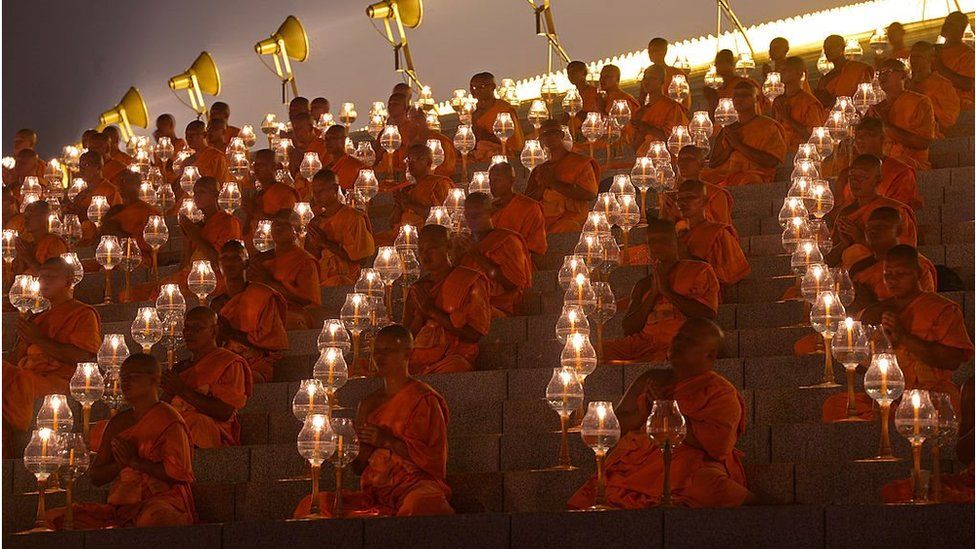 Buddhist monks chant religious verses at a Pagoda on Makha Bhucha Day at the Dhammakaya Temple in Pathumthani province on 25 February 2013.