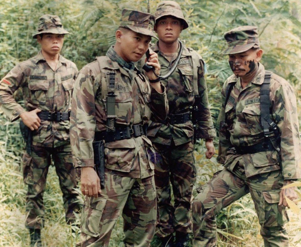 Prabowo Subianto and other men dressed in military uniform in East Timor in the late 1970s