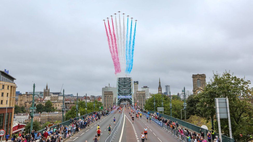 The Red Arrows fly over the Tyne Bridge during the 2021 Great North Run