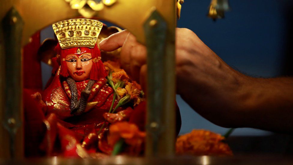 An idol of the Living Goddess Kumari is pictured inside the miniature chariot kept on display during the annual festival of Indra Jatra as the official celebration has been cancelled due to the spread of the coronavirus disease (COVID-19) in Kathmandu, Nepal September 2, 2020