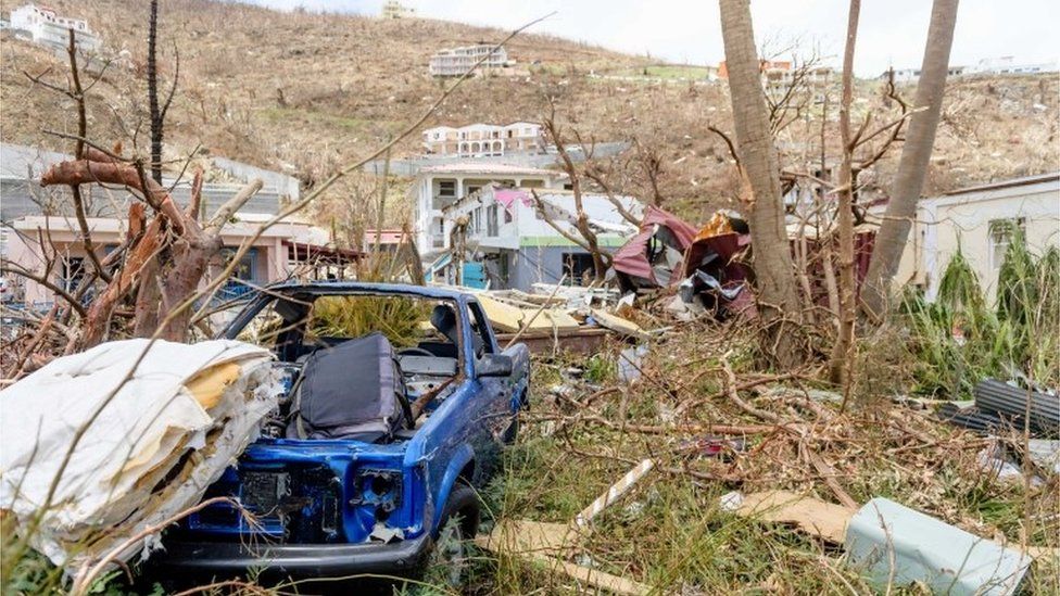 Wrecked cars and homes in the British Virgin Islands