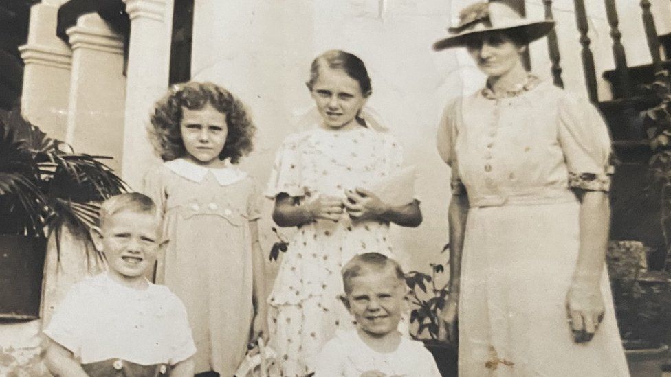 Olga, Mary, mother and brothers Peter and George c.1940 outside family home