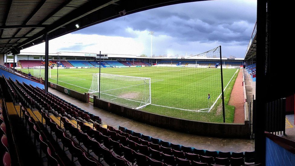 Scunthorpe United's Glanford Park view from behind the goal of the net and the pitch