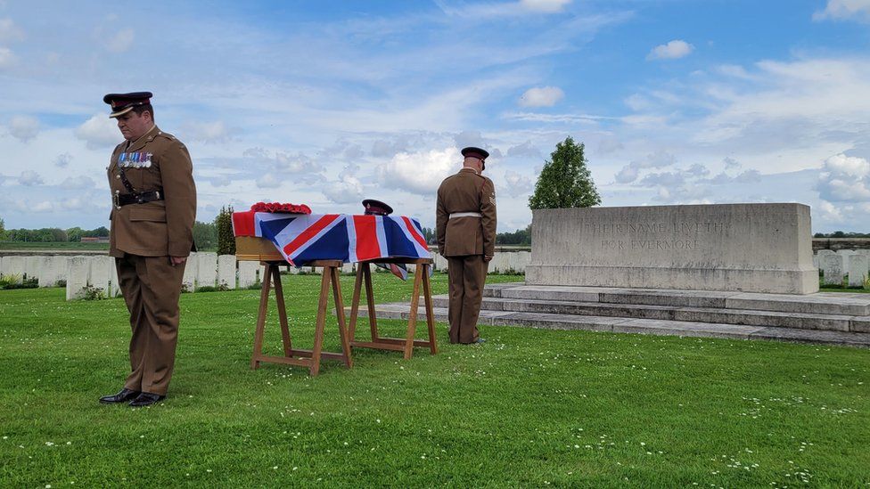 Pte Malcolm being guarded by officers of the Royal Army Medical Corps before burial on Wednesday at the Bedford House Cemetery in Ypres, located in Flanders Field