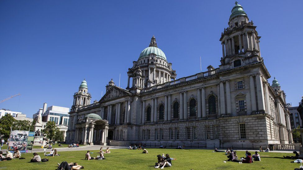 People on the lawn at Belfast City Hall