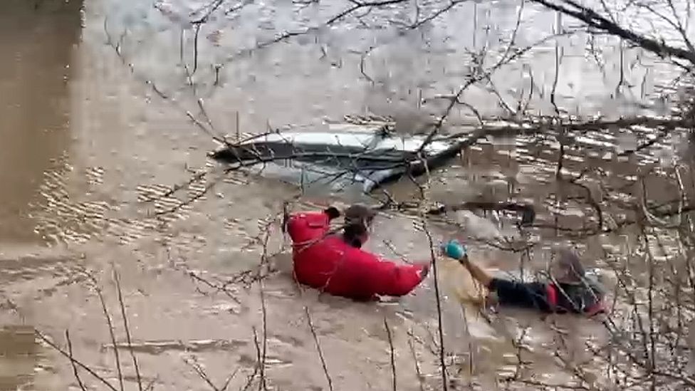 Car in flood water at Dussingdale, Norfolk