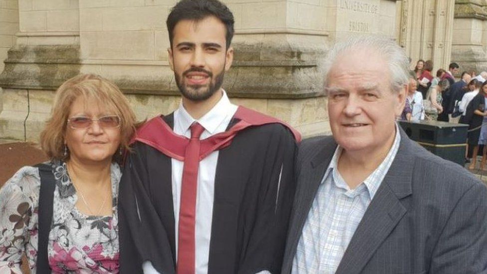 Mr Roberts and his parents at a graduation service
